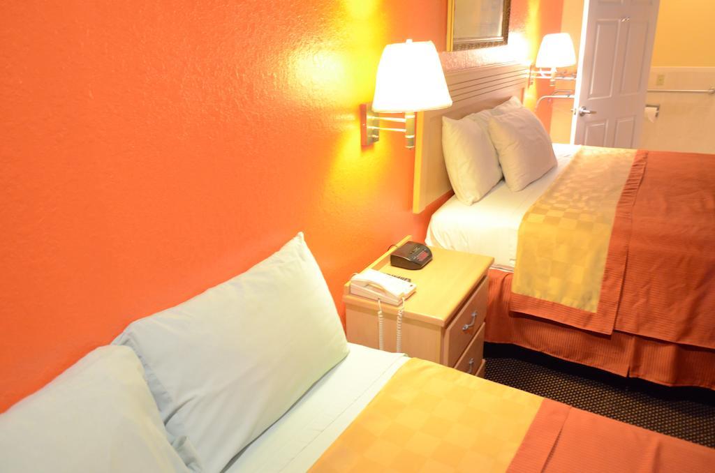Texan Inn & Suites Louetta Bagian luar foto