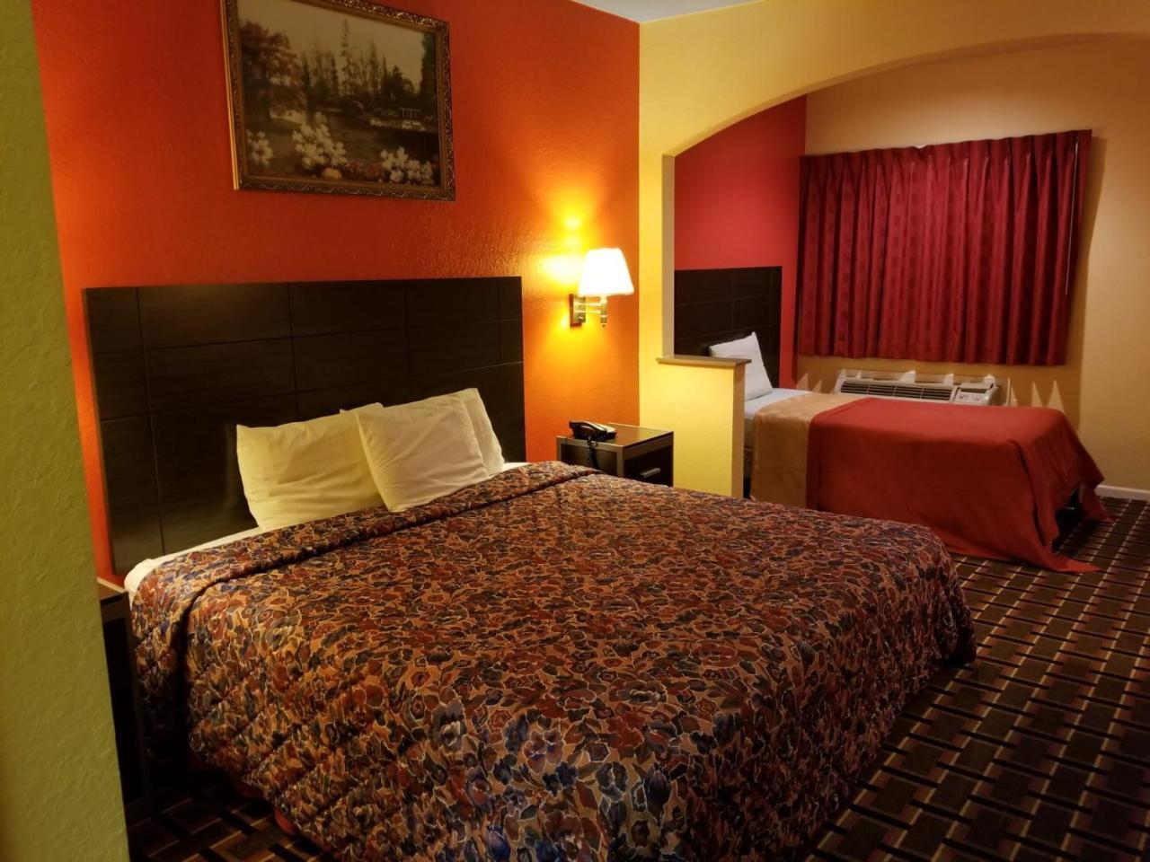 Texan Inn & Suites Louetta Bagian luar foto